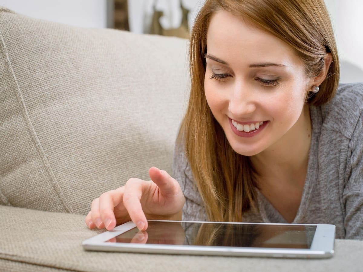 Client booking on a tablet from home